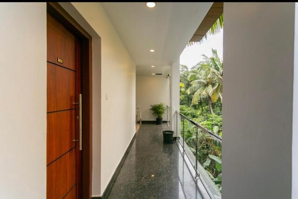 Thenmala Hormuz Inn Kolattupuzha Extérieur photo