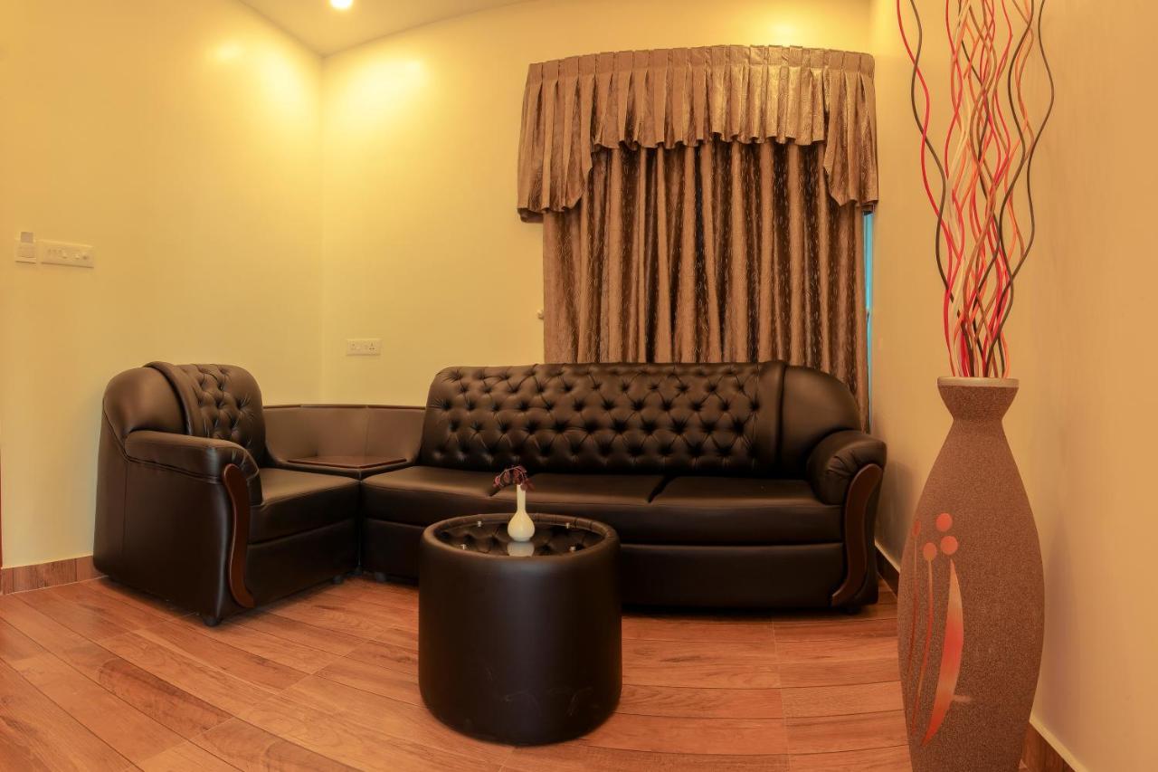 Thenmala Hormuz Inn Kolattupuzha Extérieur photo